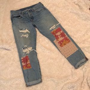 Levi’s distressed patchwork boyfriend jeans